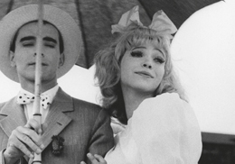 White & black picture about a couple under an umbrella
